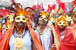 BEAUTIFULLY MASKED LADIES ENJOYING THE CARNIVAL SPIRIT