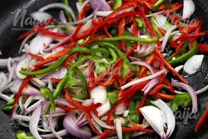 VEGETABLES BEING FRIED