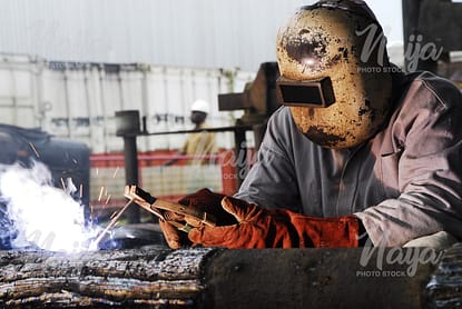 OIL AND GAS WORKER WELDING