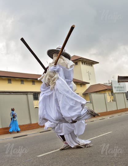 EYO MASQUERADE ON THE STREET OF LAGOS