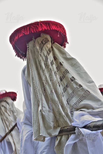 EYO MASQUERADE WITH A RED HAT