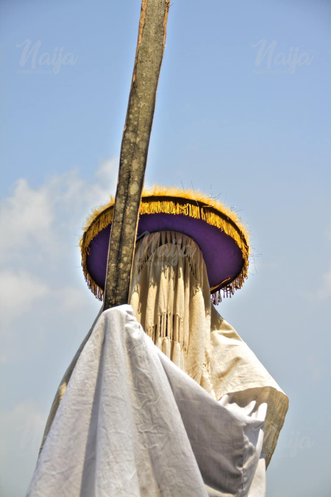 EYO MASQUERADES HOLD UP HIS STAFF