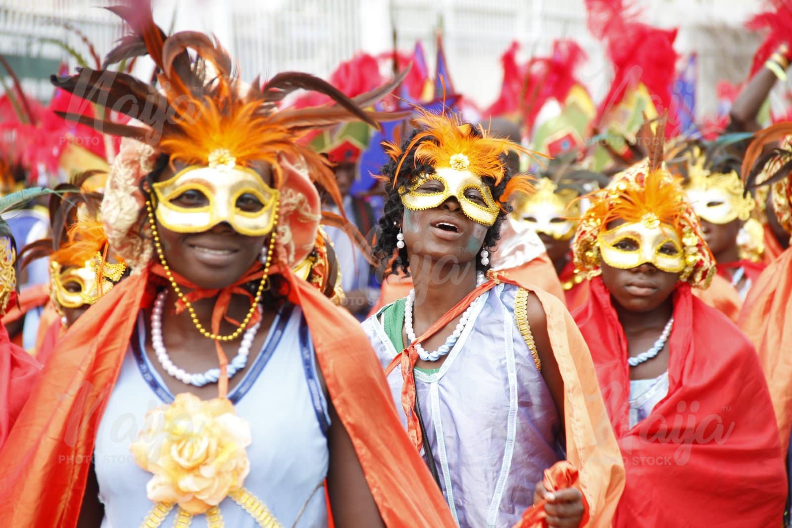 BEAUTIFULLY MASKED LADIES ENJOYING THE CARNIVAL SPIRIT
