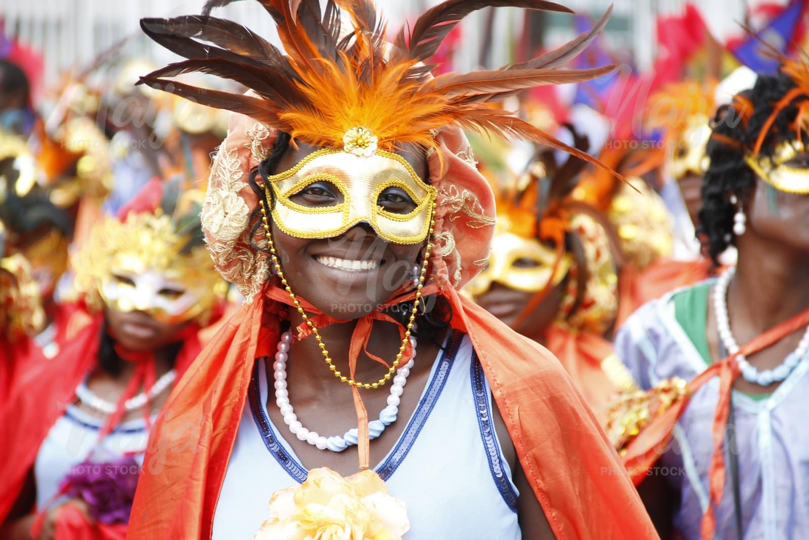 BEAUTIFULLY MASKED LADIES ENJOYING THE CARNIVAL SPIRIT