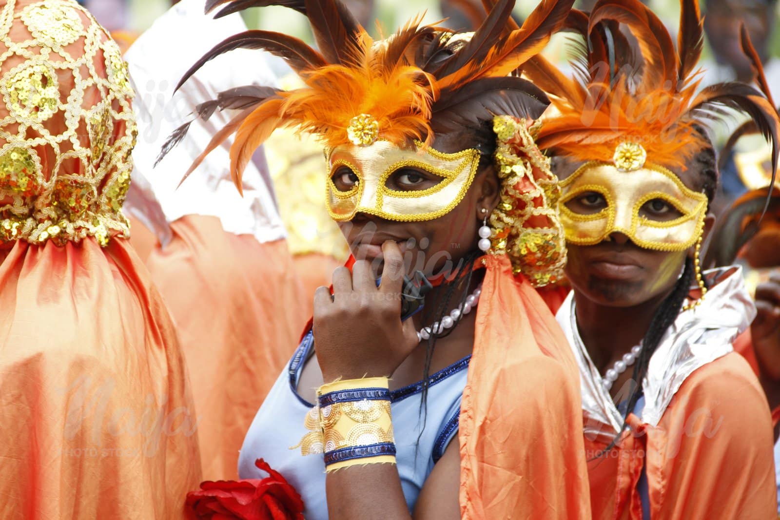 Beautifully masked ladies enjoying the carnival spirit
