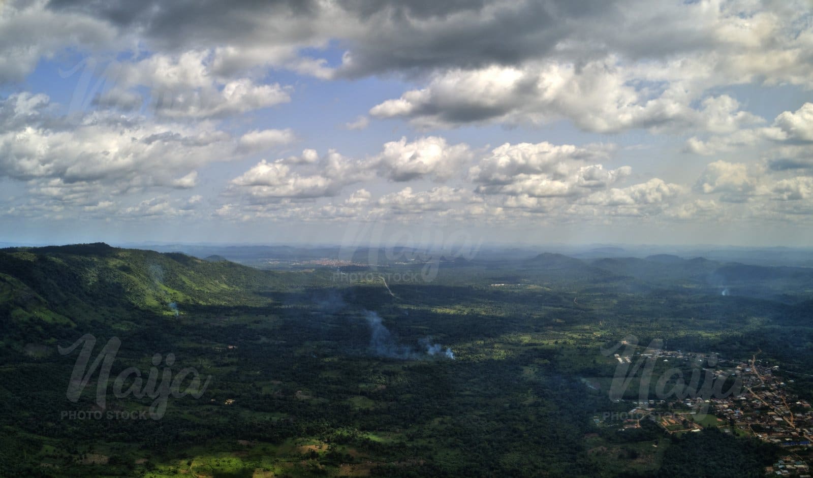 DRONE SHOT OF ERIN IJESA MOUNTAIN AND VILLAGE